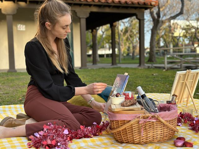 A picnic paint session at golden hour